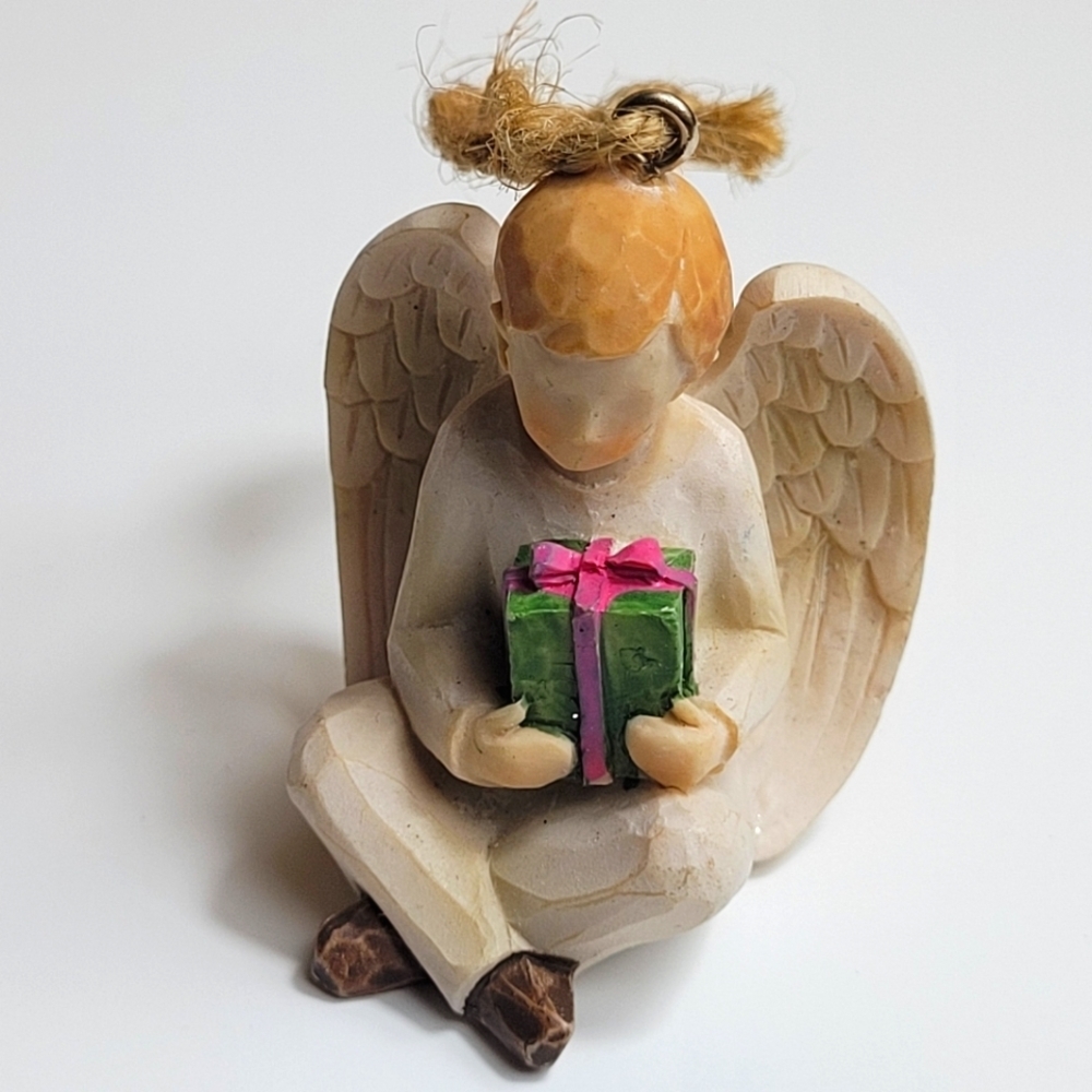 Seagull Studios sitting Guardian Angel with present Figurine Christmas ornament